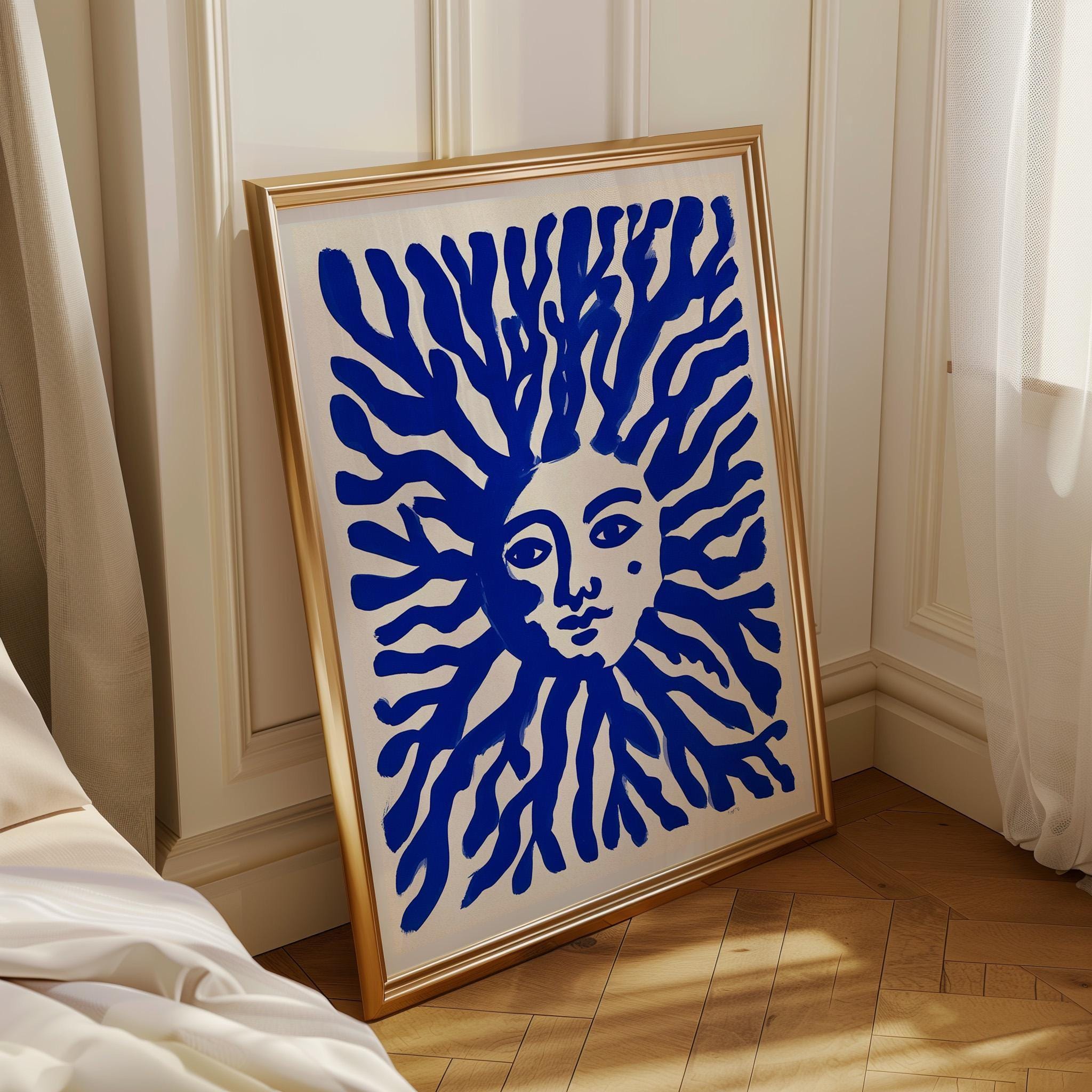 Blue Sun Face Mediterranean Coastal Celestial Wall Art by The Wall Art Studio