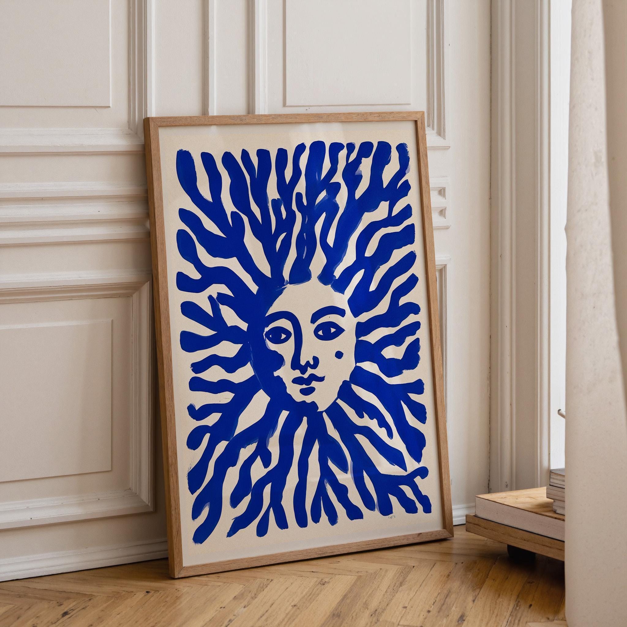Blue Sun Face Mediterranean Coastal Celestial Wall Art by The Wall Art Studio